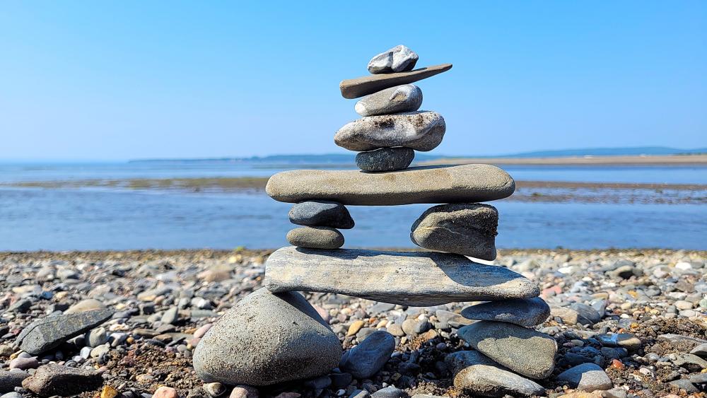 Zen Stone Balance on Gaspésie Beach wallpaper