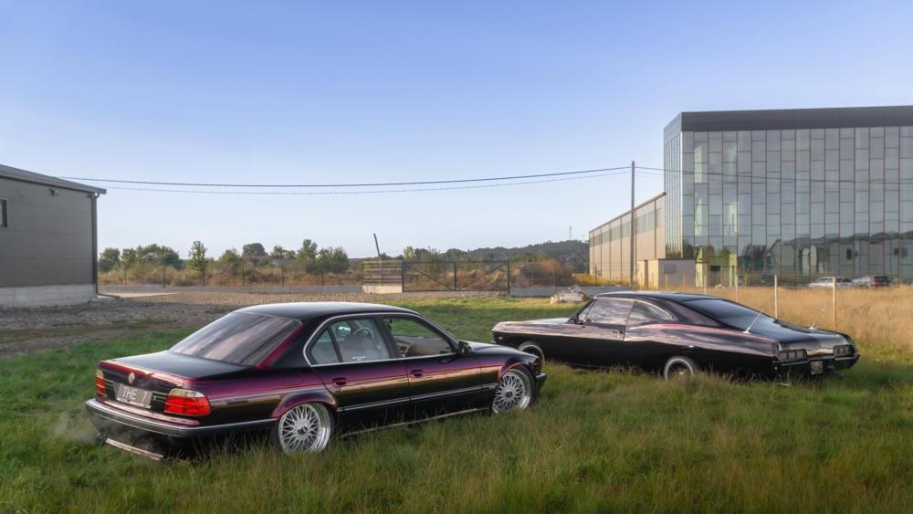 BMW and Chevrolet in Serene Outdoor Setting wallpaper