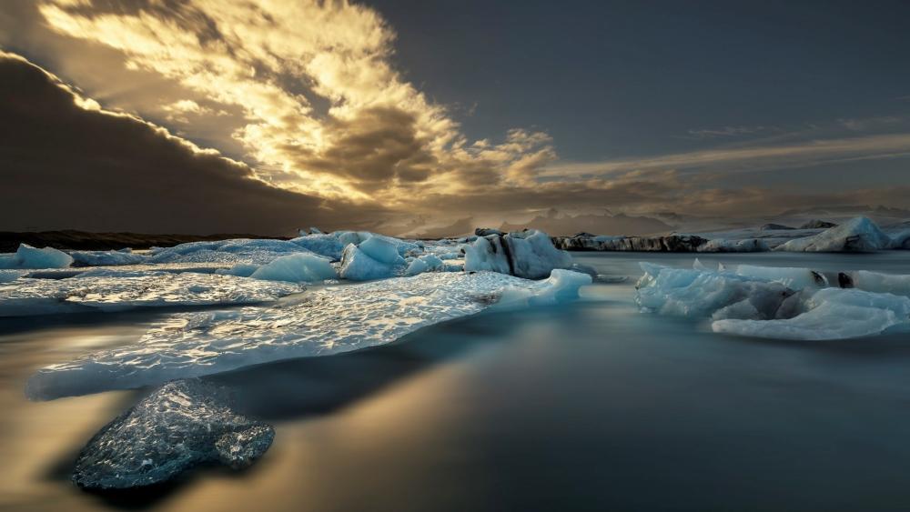 Frozen Serenity at Jökulsárlón's Glacial Lake wallpaper
