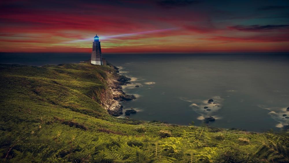 Lighthouse Illuminates a Majestic Twilight Sky in Maine wallpaper