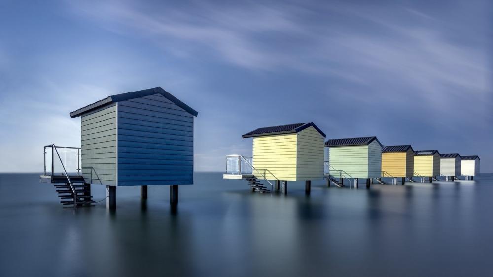Tranquil Overwater Bungalows at Osea Beach Huts wallpaper