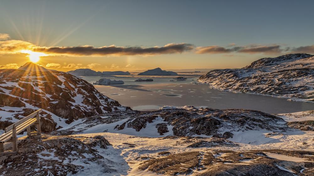 Frozen Serenity Sunrise in Greenland wallpaper