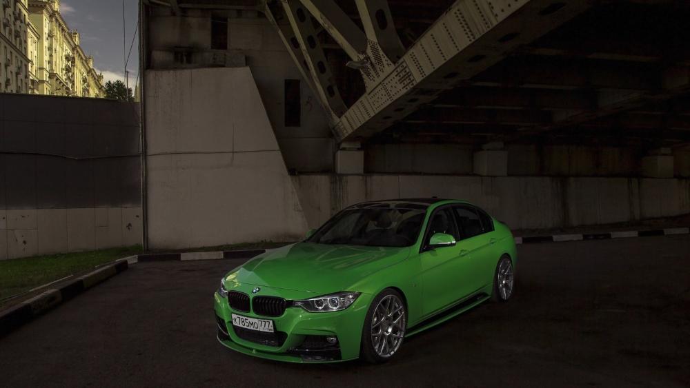 Vibrant BMW F30 Under Urban Bridge wallpaper