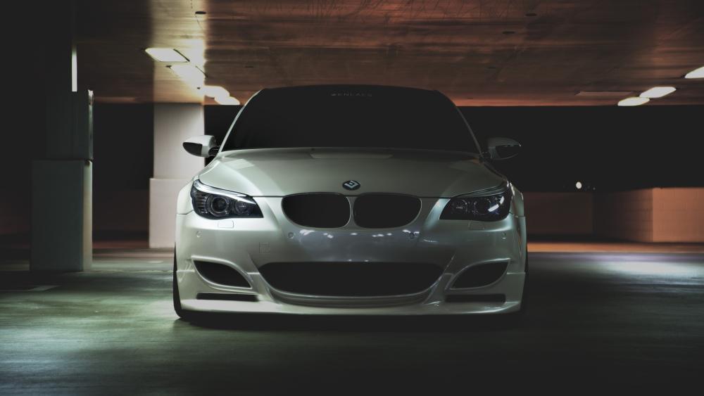 BMW M5 Striking Elegance in Shadowy Parking Garage wallpaper