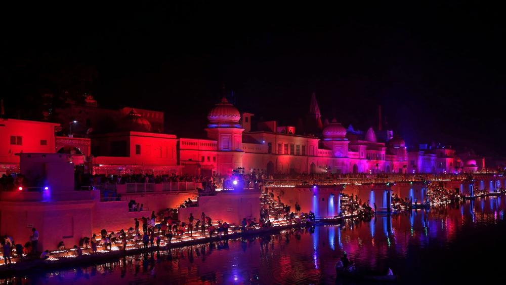 Sarayu River's Nighttime Glow in Ayodhya wallpaper