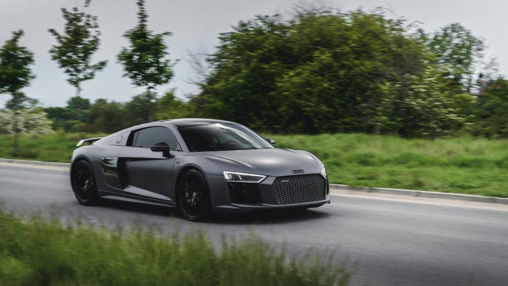 Audi R8 in Motion on Scenic Road wallpaper