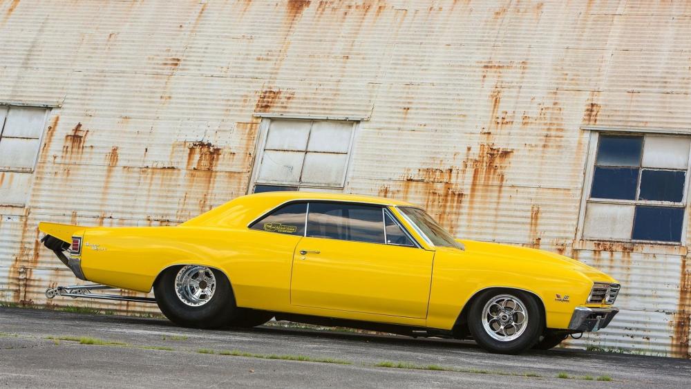 Vintage Vibes with a Yellow Chevrolet Chevelle wallpaper