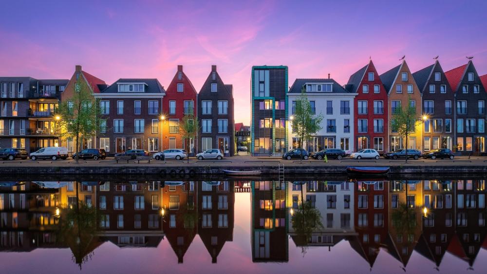 Colorful Canal Houses at Dusk in Vathorst Amersfoort wallpaper