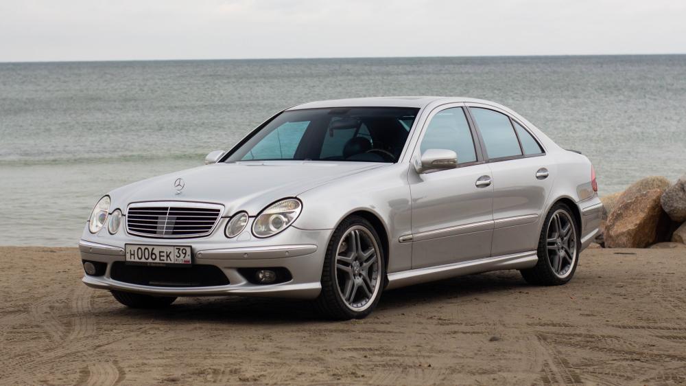 Timeless Elegance Silver Mercedes-Benz by the Sea wallpaper