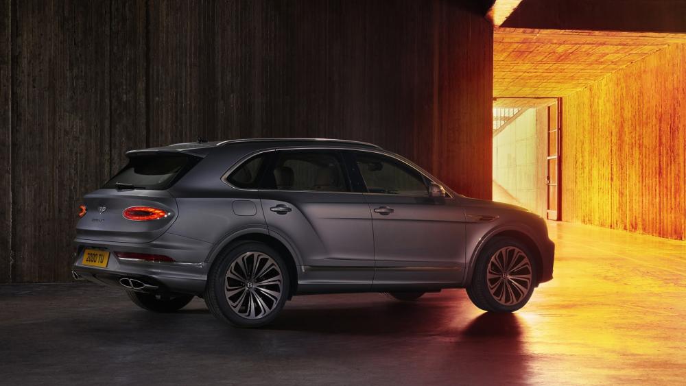 Luxurious Elegance in Motion Bentley Bentayga SUV wallpaper