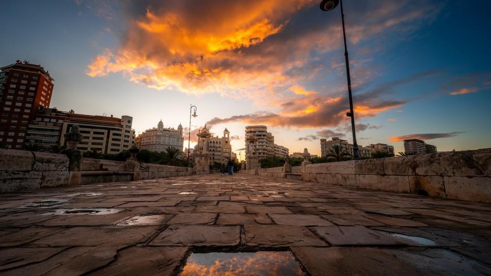 Sunset Serenity Over Historic Cityscape wallpaper