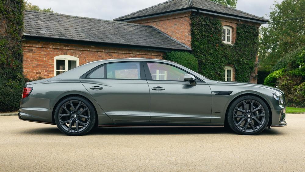 Sleek Design Meets Timeless Luxury in Modern Sedan wallpaper
