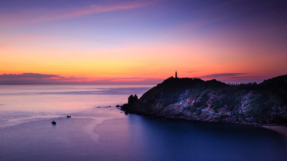 Serene Sunset Over Tranquil Shoreline wallpaper