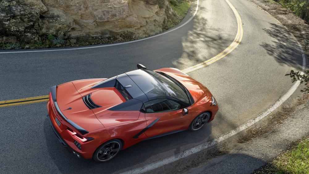 Sleek Chevy Corvette on a Winding Roadway wallpaper