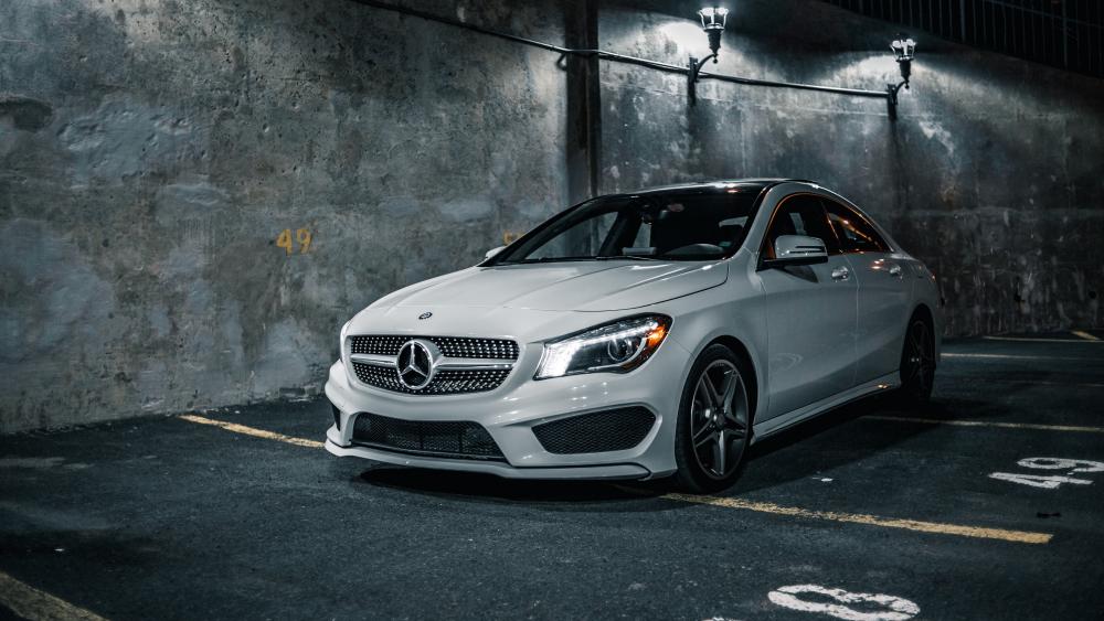 Sleek White Mercedes in Urban Night Setting wallpaper