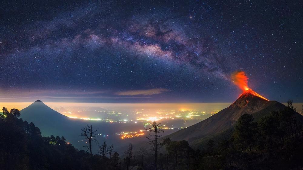 Majestic Volcano Under a Starry Sky wallpaper