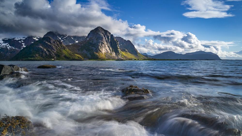 Majestic Mountains Embracing Serene Waters wallpaper