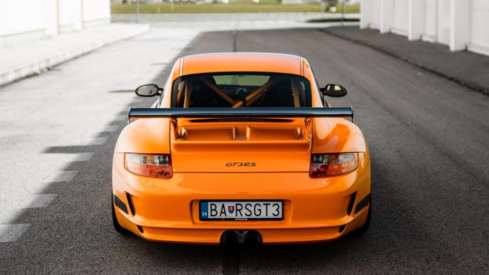 Vibrant Orange Porsche GT3 Wallpaper wallpaper