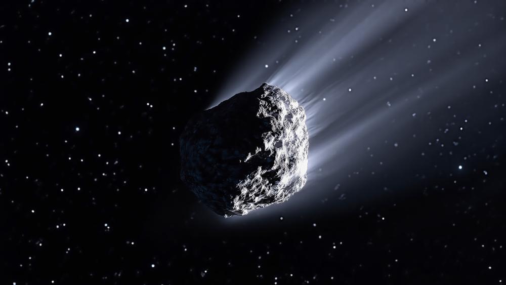 Ethereal Frozen Comet Gliding Through Space wallpaper