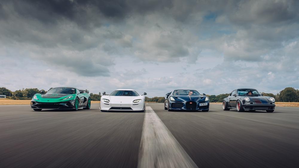 Sleek Lineup of Supercars in Action wallpaper