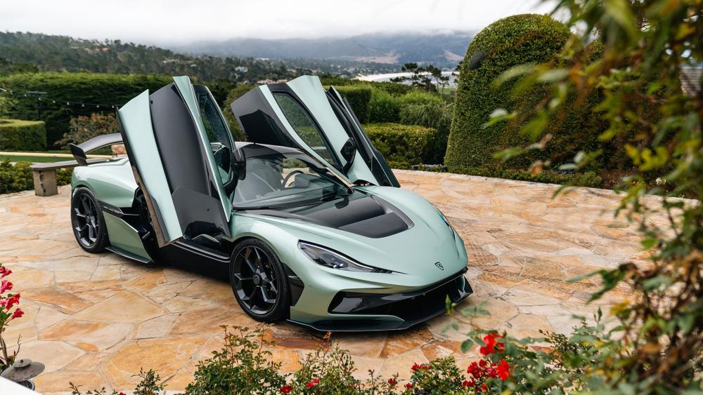 Sleek Luxury Rimac Nevera Supercar in Stunning Outdoor Setting wallpaper