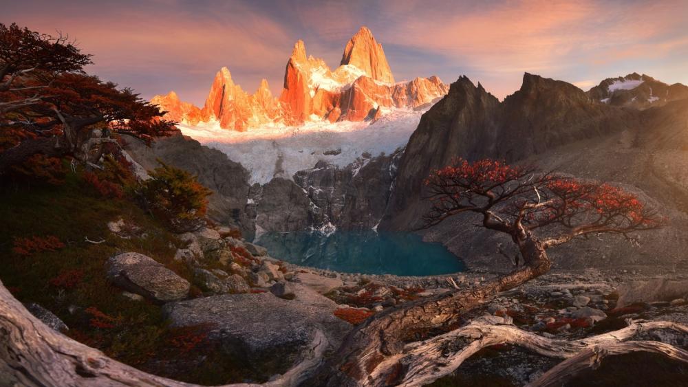 Sunrise Glow on Mount Fitz Roy Above a Patagonian Lagoon wallpaper