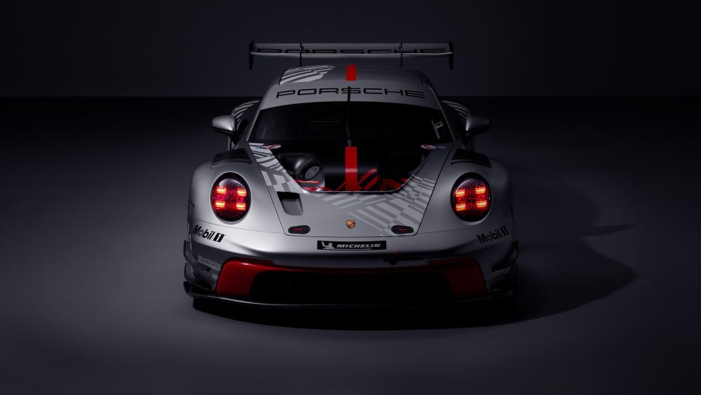 Porsche 911 GT3 R Front View in Moody Studio Light wallpaper