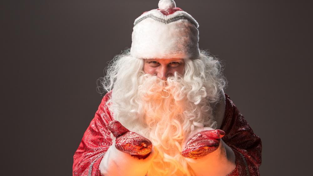 Glowing Santa Claus Portrait in Festive 5K Holiday Light wallpaper