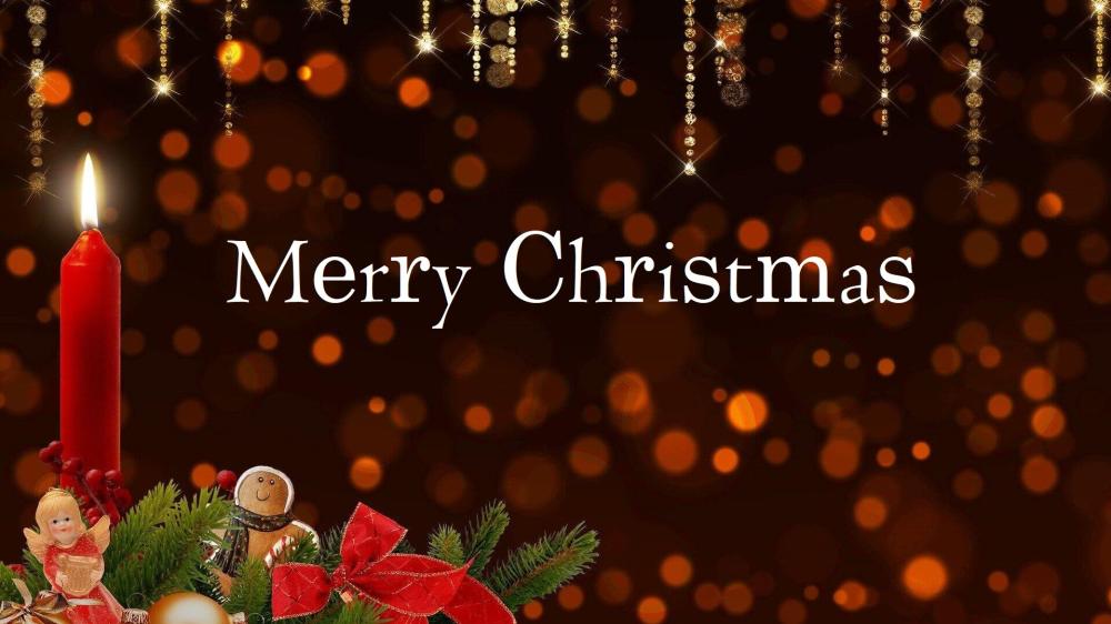 Warm Merry Christmas Candlelight with Golden Bokeh and Sparkling Ornaments wallpaper