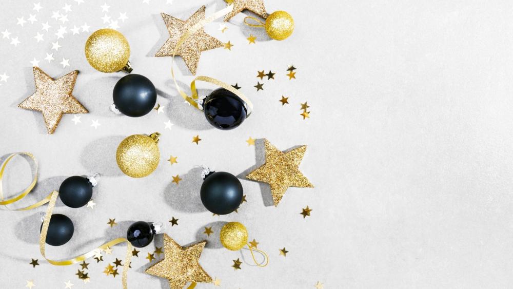 Minimalist Christmas Celebration with Gold Stars and Black Ornaments wallpaper