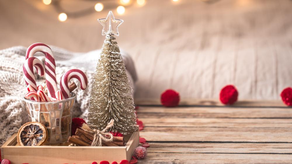 Cozy Merry Christmas Decor with Candy Canes and Glittering Tree wallpaper