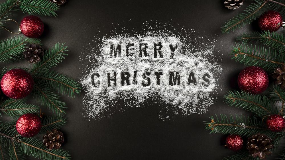 Snowy Merry Christmas Greeting with Fir Branches and Red Ornaments wallpaper