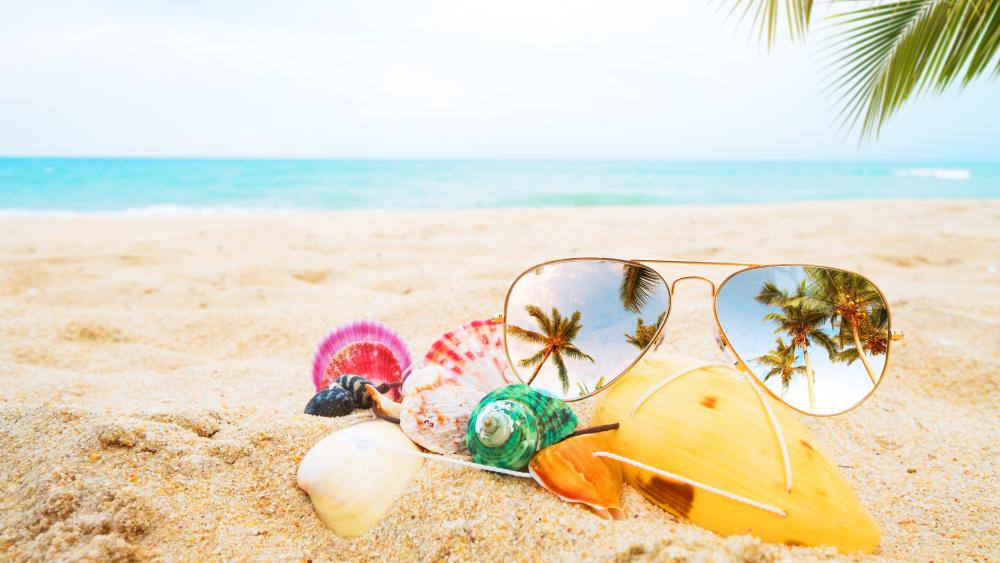Sunlit Beach Escape Reflected in Sunglasses and Seashells wallpaper