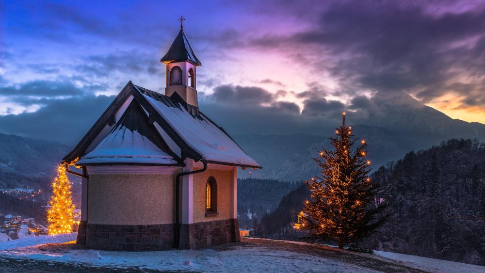 Snowy Kirchleitn Chapel and Christmas Lights at Berchtesgaden Dusk wallpaper