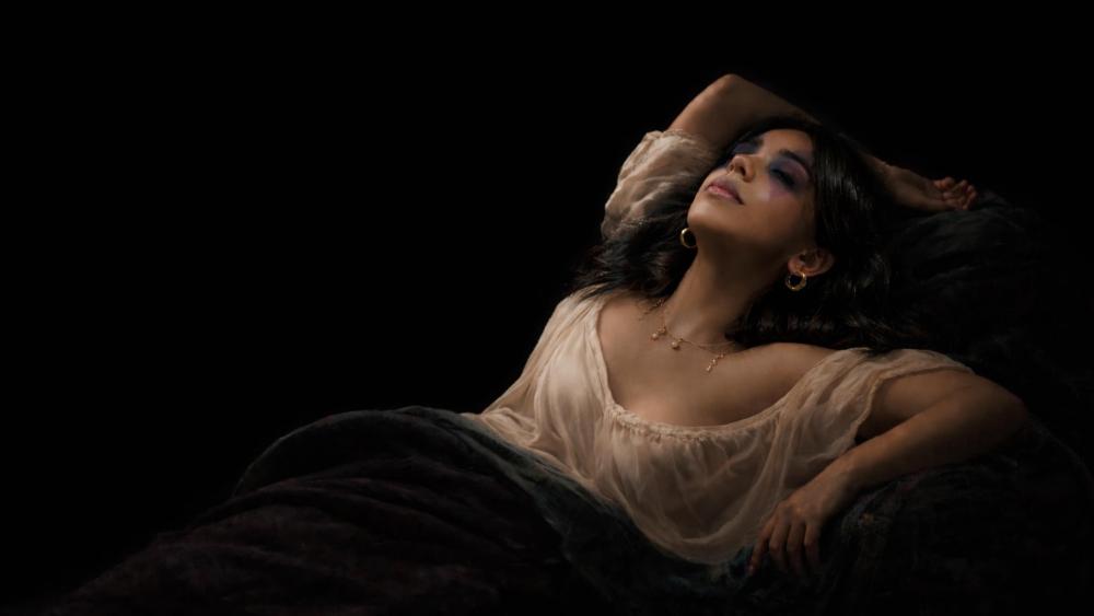 Dreamlike Sleeping Beauty Portrait in Soft Shadows and Black Hair wallpaper
