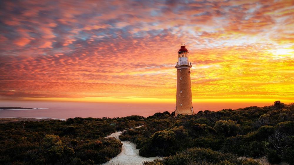 Cape du Couedic Lighthouse Under Fiery Australian Sunset Skies wallpaper