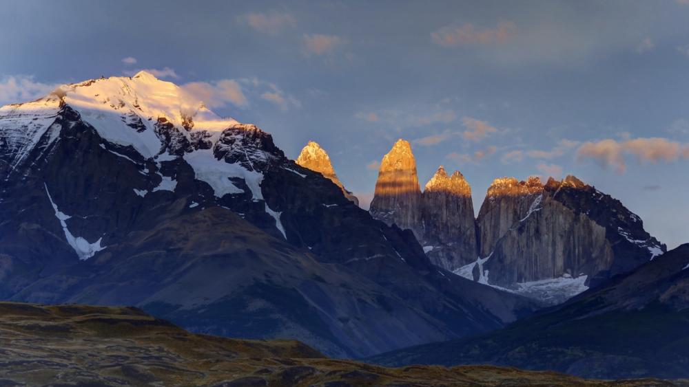 Golden Sunrise on Cerro Paine Grande and the Torres del Paine Peaks wallpaper