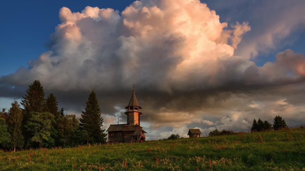Stormlight Over Kizhi Island Meadow and Wooden Chapel wallpaper