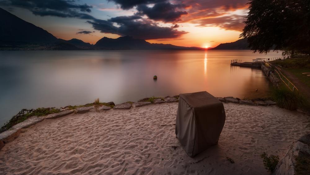 Afterglow Over a Quiet Lakeside Coast at Dusk wallpaper