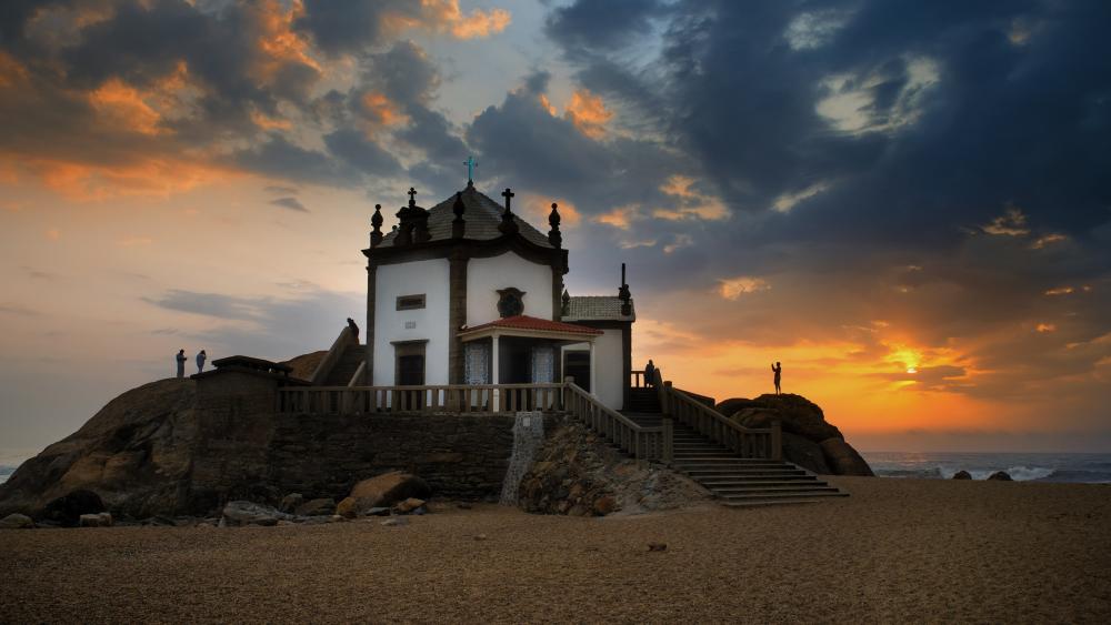 Sunset Serenity at Capela do Senhor da Pedra by the Atlantic Sea wallpaper