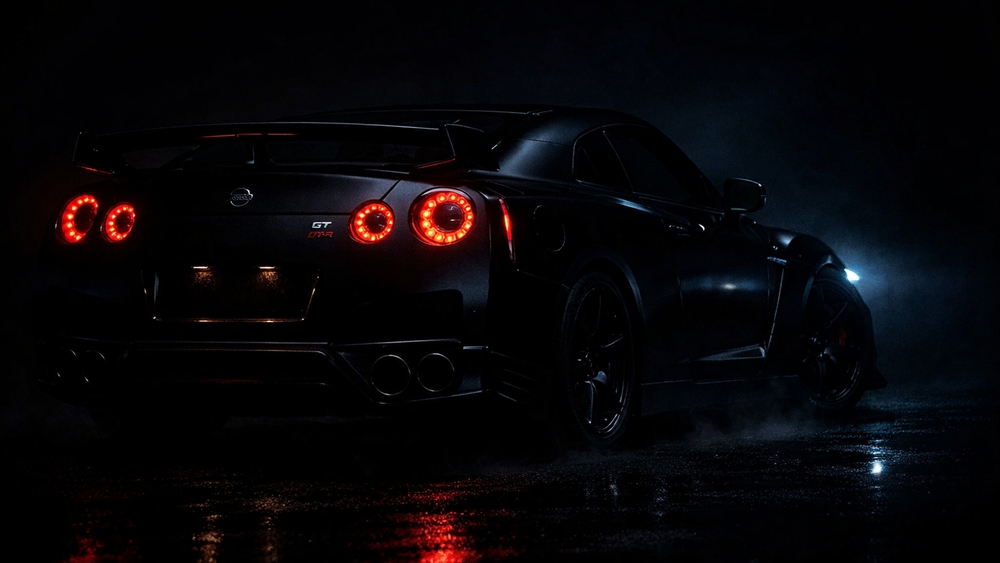 Midnight Nissan GT-R R35 Rear View in Rainy Neon Glow wallpaper
