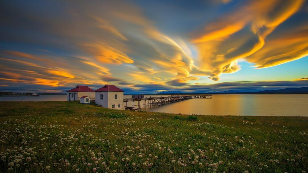 Dusk Skies Over The Singular Patagonia Pier In Puerto Bories Chile wallpaper