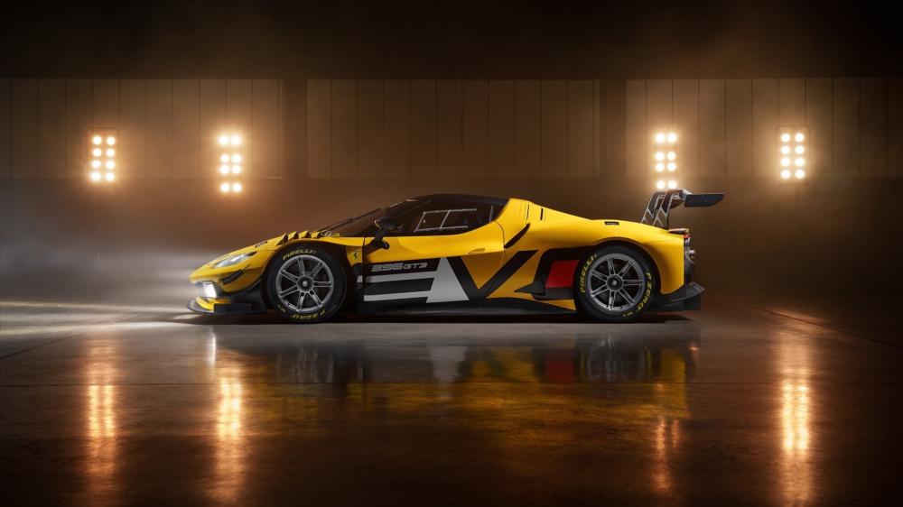 Yellow Ferrari 296 GT3 Evo Race Car Studio Spotlight Wallpaper wallpaper