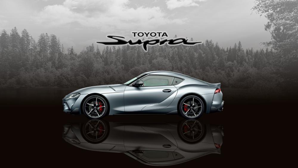 Monochrome Toyota Supra MK5 Reflection Against Misty Forest Backdrop wallpaper