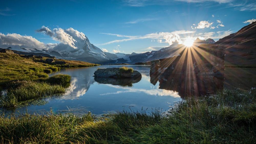 Sunrise Reflections at Riffelsee Beneath the Majestic Matterhorn wallpaper
