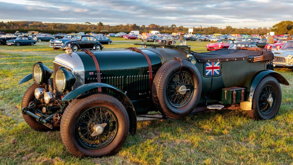 Vintage Bentley Racer on Sunset Field in Crisp 5K Detail wallpaper