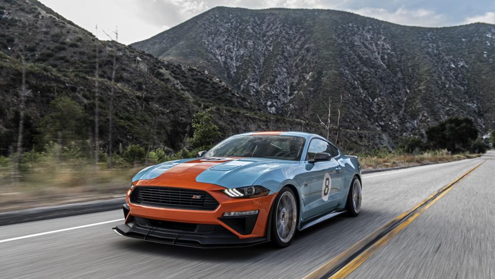 Ford Mustang Race Car Charging Through Mountain Highway in 8K wallpaper