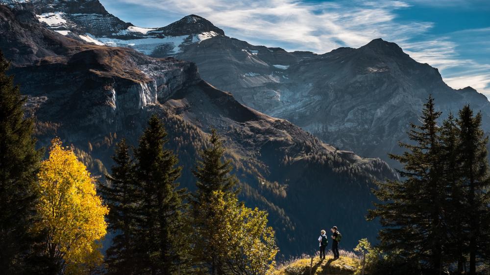 Autumn Hike Beneath Majestic Alpine Peaks in Crisp 4K wallpaper