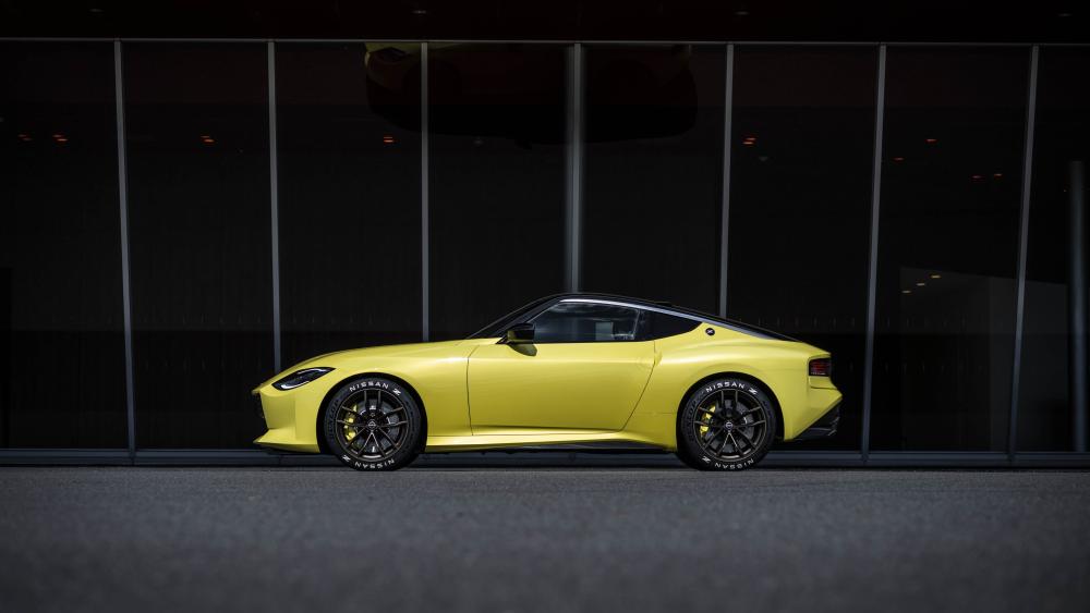 Sleek Yellow Nissan Z Profile in Shadowy Urban Glass wallpaper