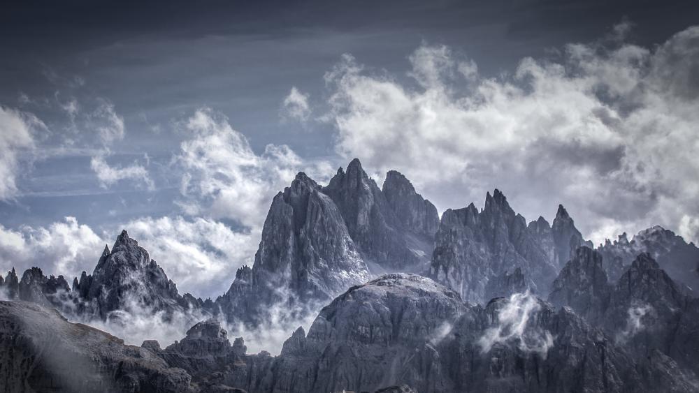 Misty Peaks of Cadini di Misurina in the Italian Dolomites wallpaper